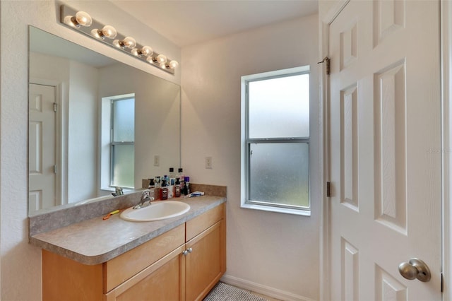 bathroom featuring oversized vanity