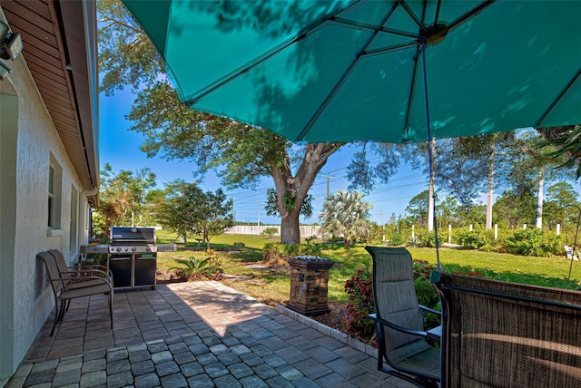 view of terrace with area for grilling