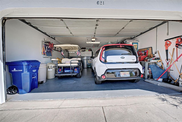 garage featuring a garage door opener