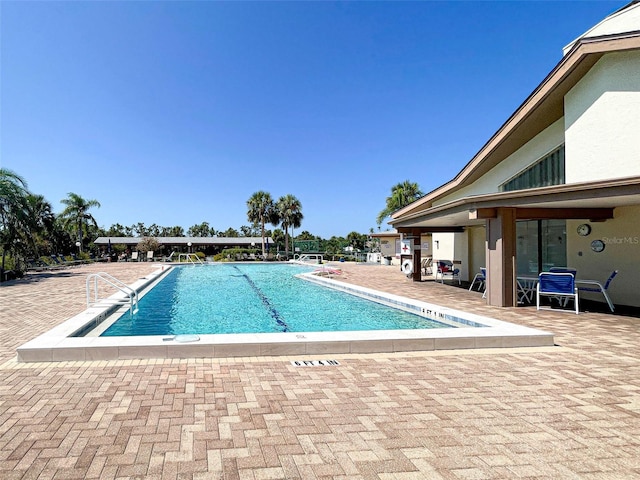 view of pool with a patio