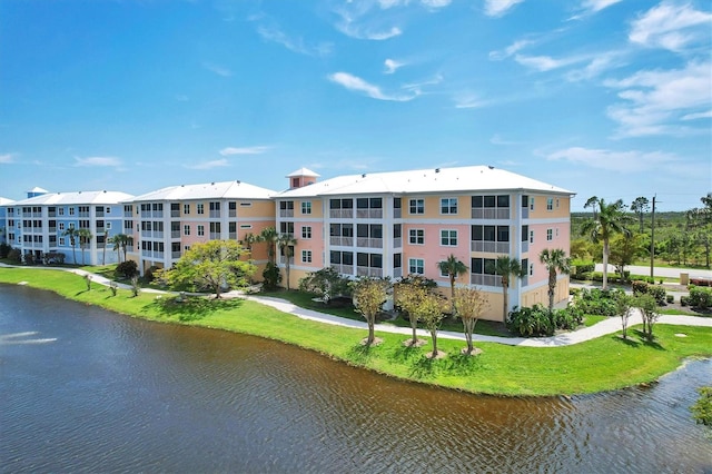 view of building exterior featuring a water view