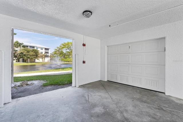 garage featuring a water view