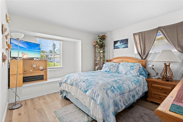 bedroom featuring hardwood / wood-style floors