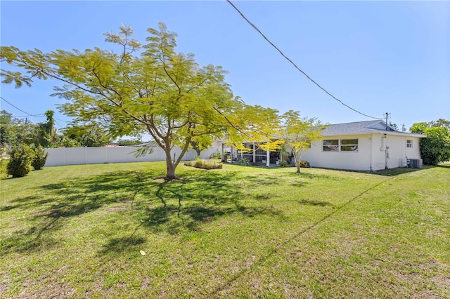 view of yard featuring central AC