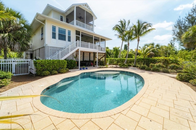 view of swimming pool featuring a patio area