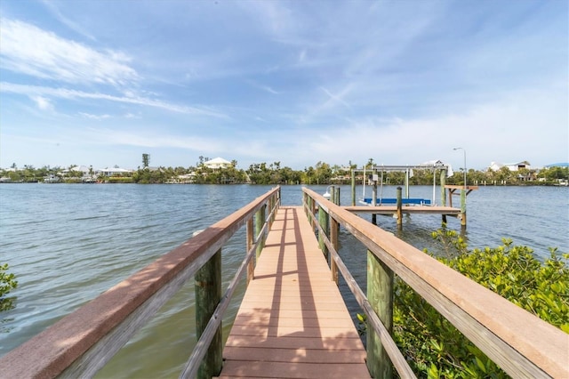 dock area featuring a water view