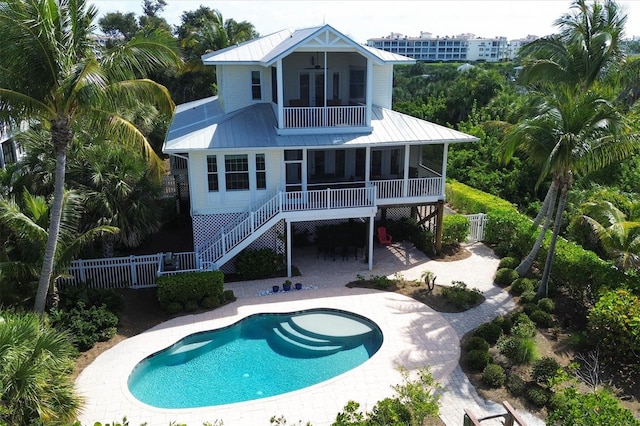 back of house with a patio area