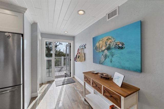 doorway featuring light hardwood / wood-style floors