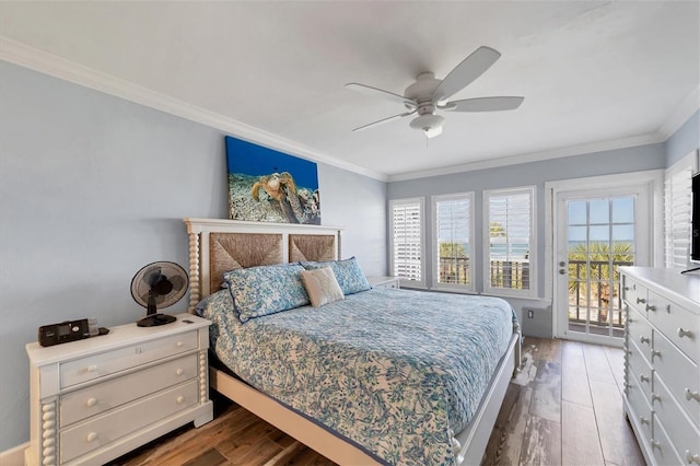 bedroom featuring ornamental molding, wood-type flooring, and ceiling fan