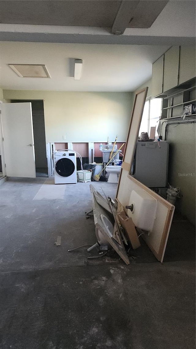 interior space with washer / clothes dryer