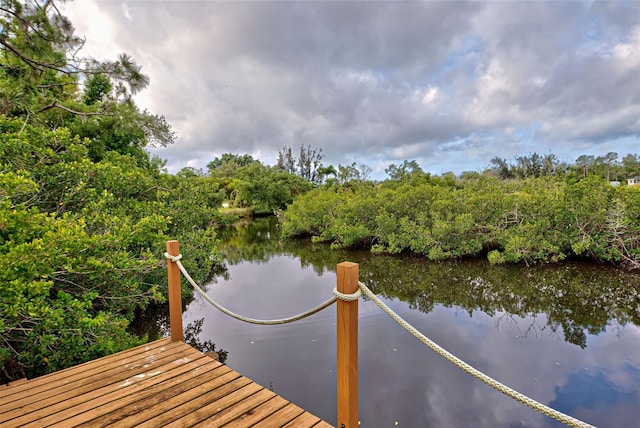 view of dock with a water view