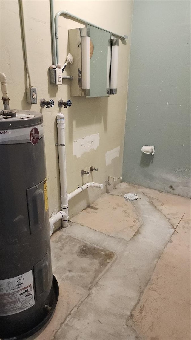 utility room featuring water heater