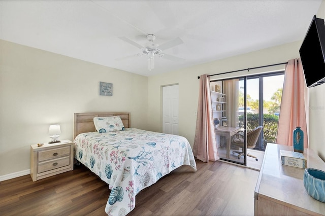 bedroom with dark hardwood / wood-style flooring, access to exterior, ceiling fan, and a closet