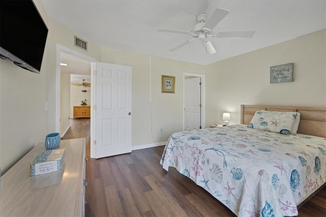 bedroom featuring dark hardwood / wood-style floors and ceiling fan