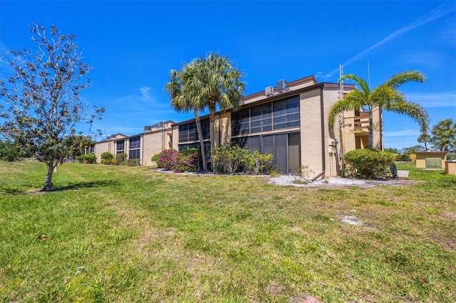 exterior space with a lawn