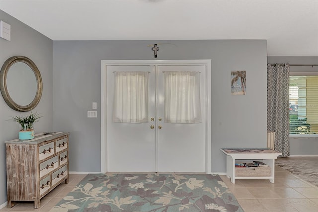 tiled entryway with french doors