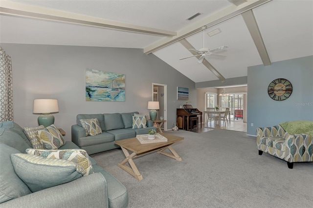 carpeted living room with high vaulted ceiling, ceiling fan, and beamed ceiling