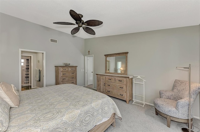 bedroom featuring ceiling fan and light carpet