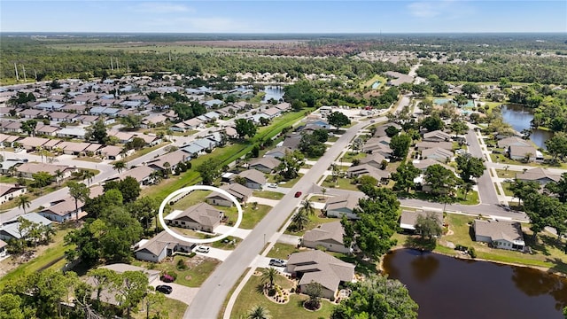 drone / aerial view with a water view