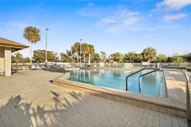 view of swimming pool featuring a patio