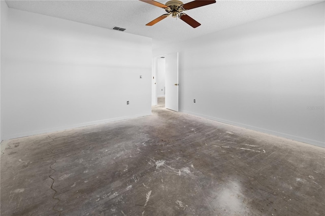 unfurnished room with ceiling fan