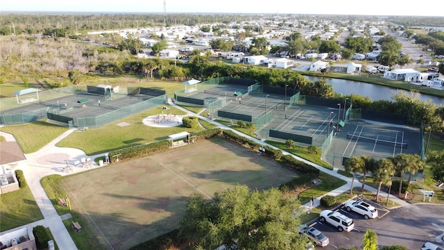 birds eye view of property featuring a water view