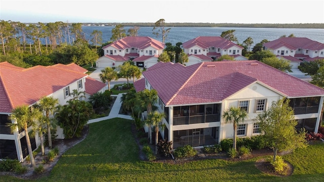 bird's eye view with a water view