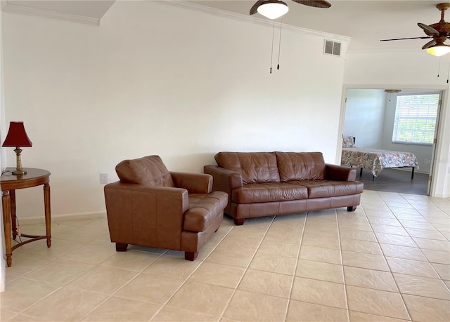 living room with light tile patterned floors, crown molding, and ceiling fan