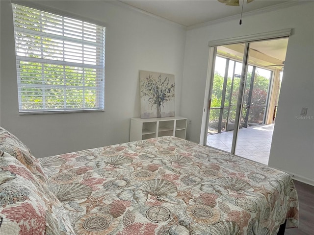 bedroom with access to exterior and ornamental molding