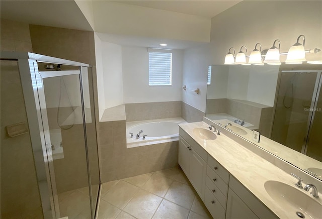 bathroom with plus walk in shower, tile patterned floors, and vanity