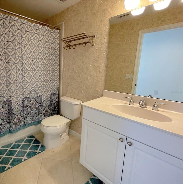 full bathroom with vanity, tile patterned floors, toilet, and shower / bathtub combination with curtain