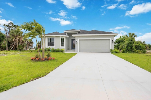 view of front facade featuring a garage and a front lawn