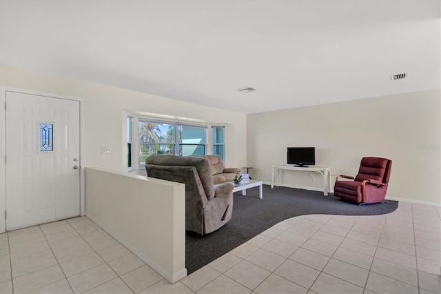 living room with light tile floors