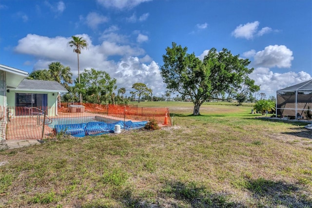 view of yard with a patio area and a fenced in pool