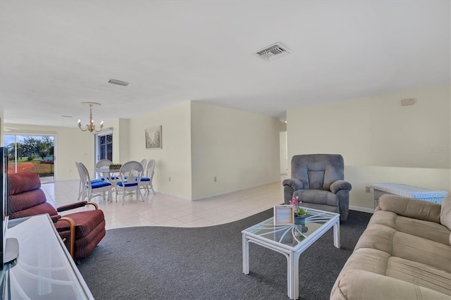 tiled living room featuring a chandelier