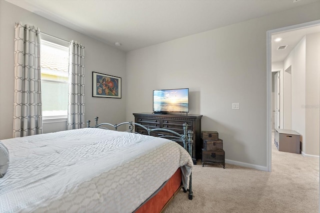 bedroom featuring carpet