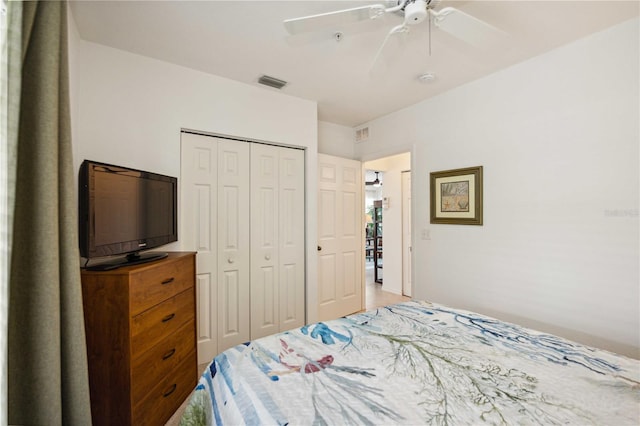 bedroom with a closet and ceiling fan