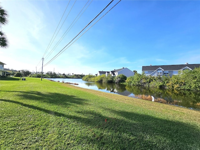 view of yard with a water view