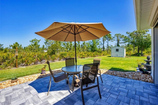 view of patio with a storage unit