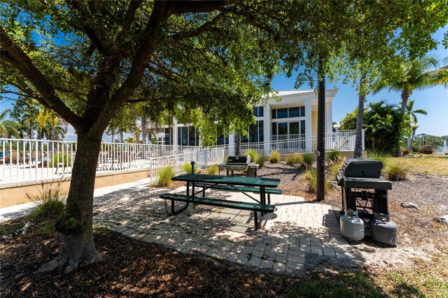 view of property's community featuring a patio area