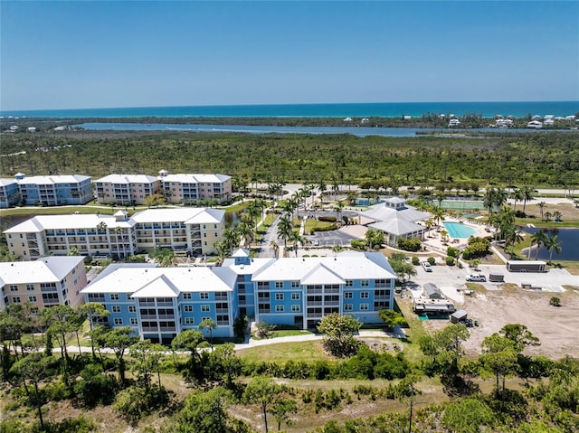 drone / aerial view with a water view