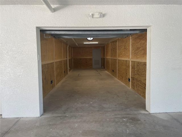 corridor with concrete floors