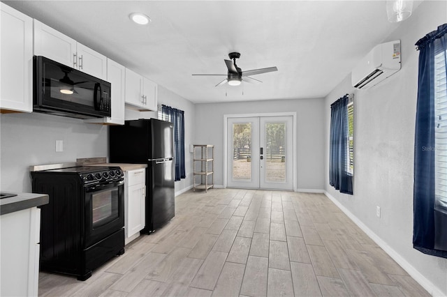 kitchen featuring white cabinetry, french doors, light wood-type flooring, black appliances, and ceiling fan