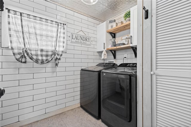 laundry area with independent washer and dryer and washer hookup