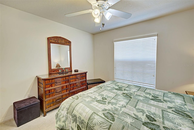 bedroom featuring ceiling fan and carpet flooring