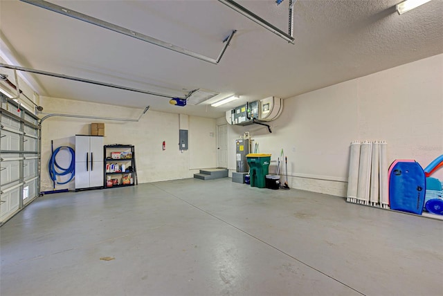 garage featuring a garage door opener and white fridge