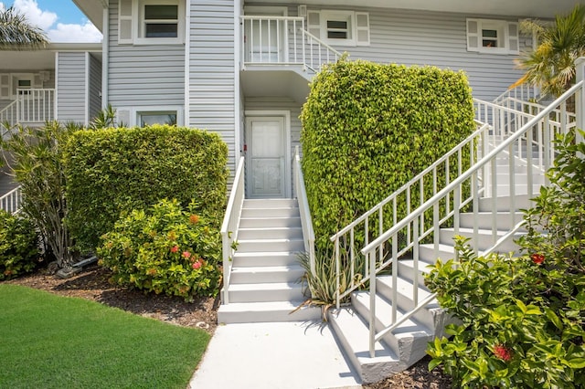 entrance to property with a balcony