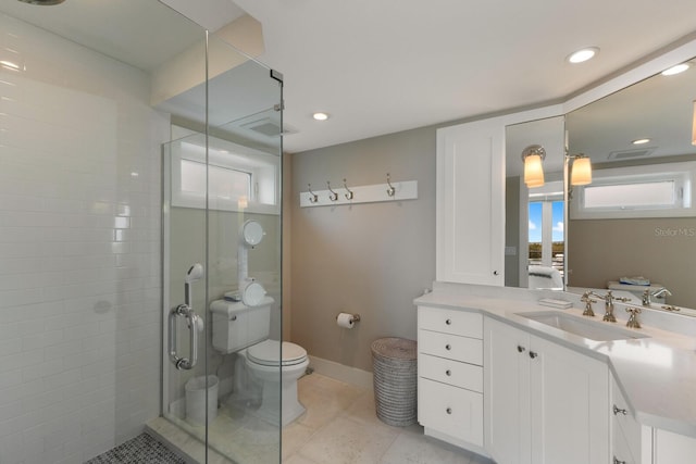 bathroom featuring tile floors, walk in shower, toilet, and vanity