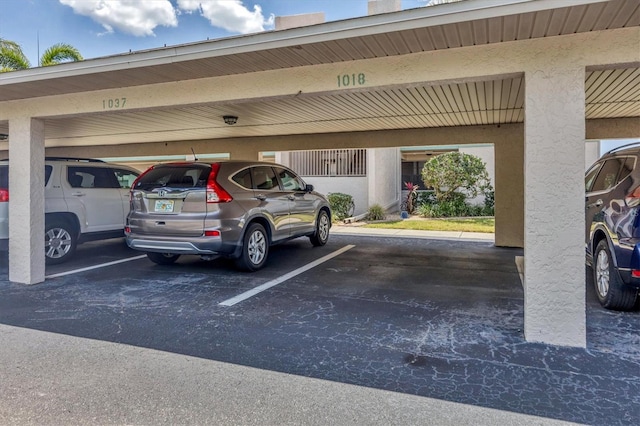 view of car parking with a carport