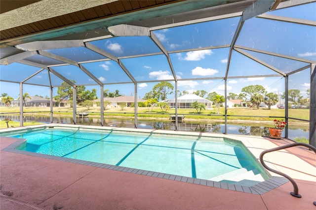 view of pool featuring a lanai, a patio area, and a water view